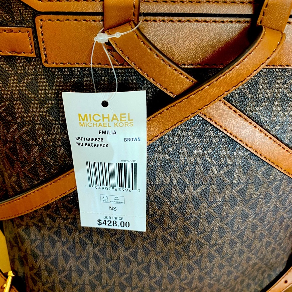 Michael Kors Large backpack style purse. Brand new with tags.